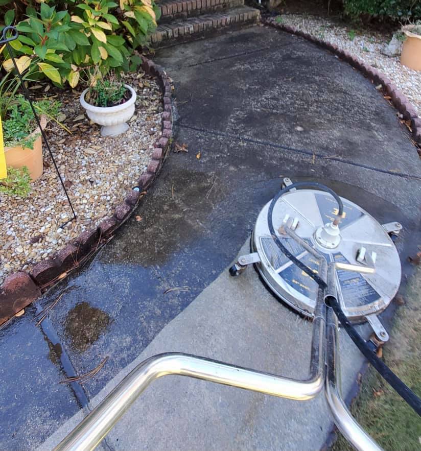 Surface cleaner on a concrete walkway